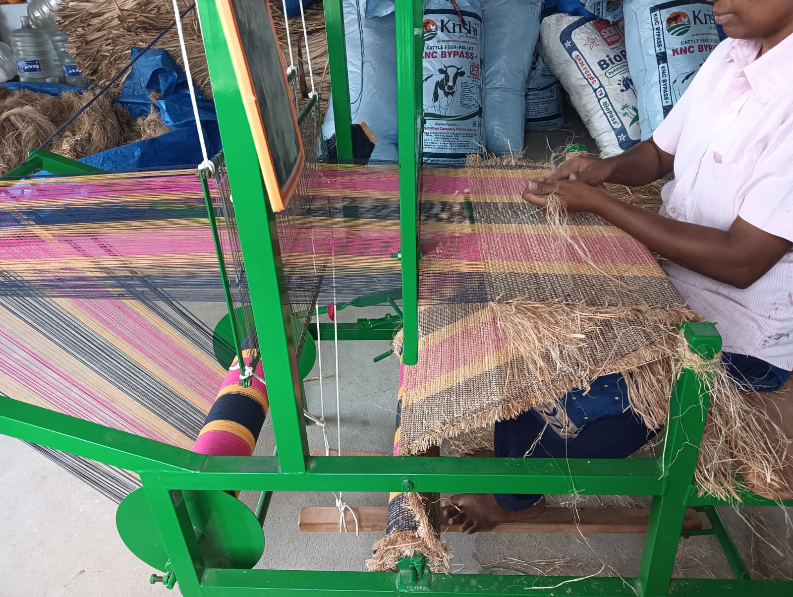 Banana fibre being loaded onto the weaving loom